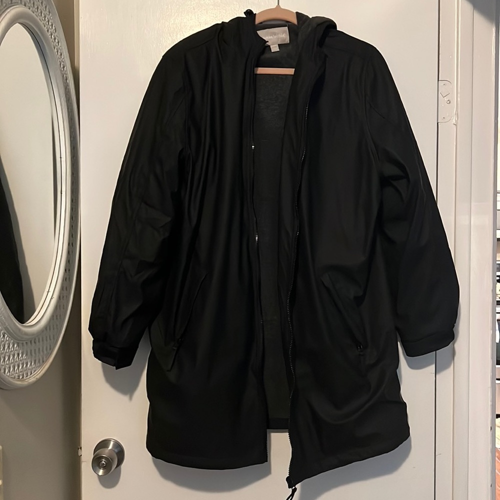 Black water resistant rain coat size 18/20 never worn